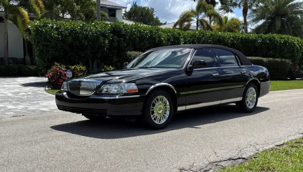 Luxury Black Sedan — Lincoln Town Car